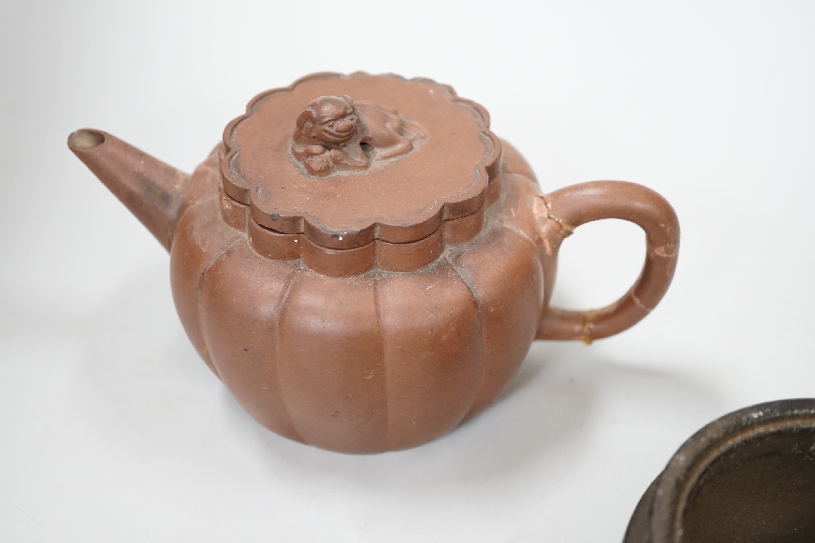 A Chinese Yixing teapot and a bronze censer, teapot 10 cm high